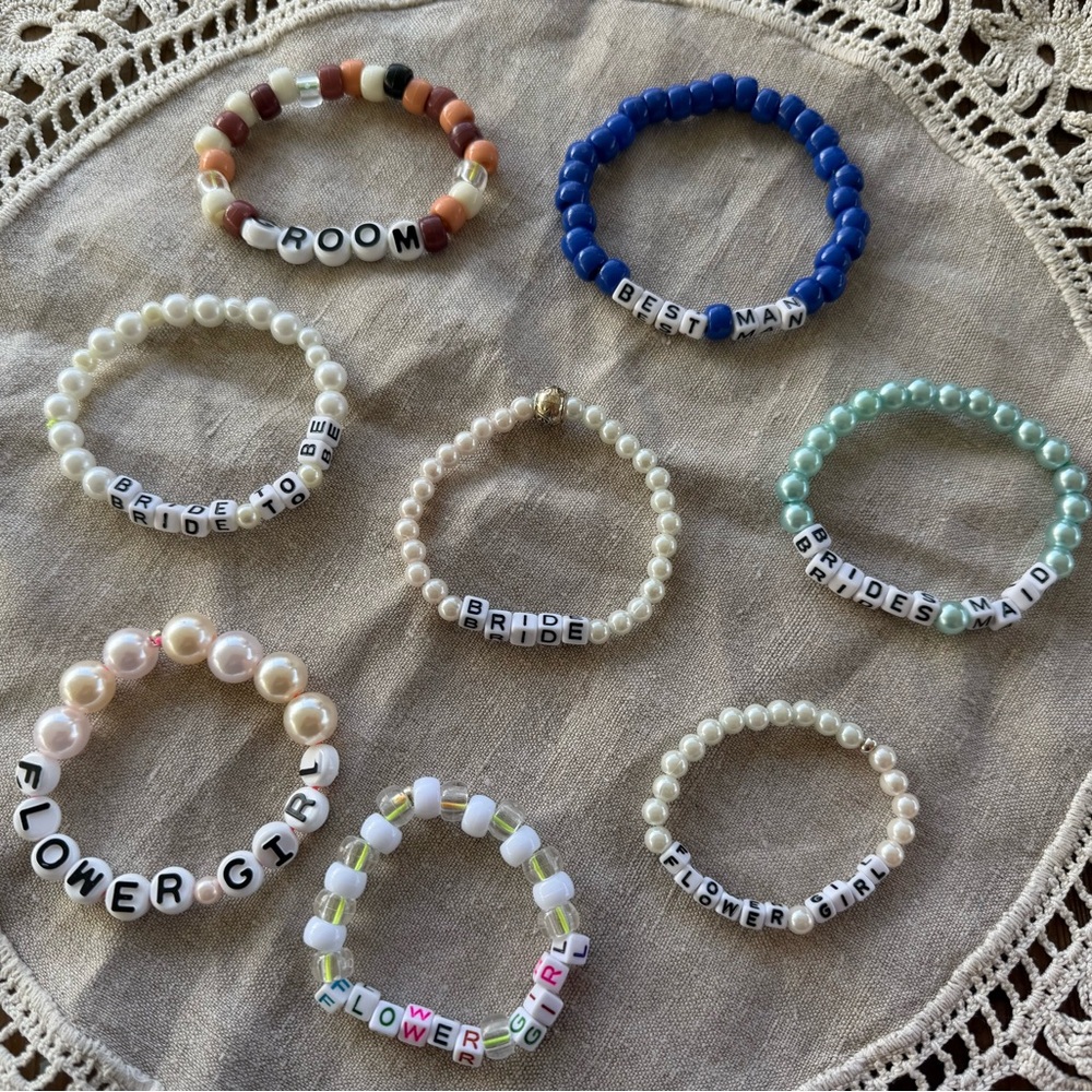 Wedding themed bracelets hand made by me .